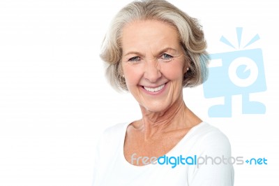 Happy Smiling Aged Lady Facing Camera Stock Photo
