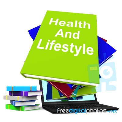 Health And Lifestyle Book Stack Laptop Shows Healthy Living Stock Image