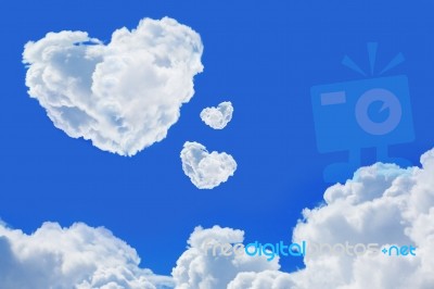 Heart Cloud In Blue Sky Stock Photo