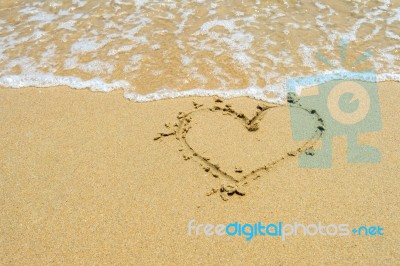 Heart In The Sand On The Beach Stock Photo