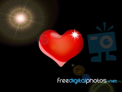 Heart  On A Black Background And Sun Stock Image
