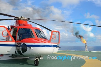 Helicopter Park On Oil Rig Stock Photo