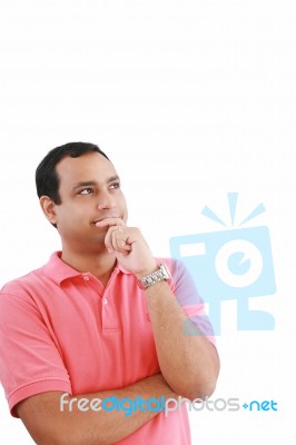 Hispanic Man Looking And Thinking Stock Photo