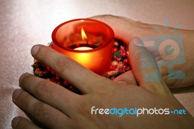 Holding A Candle Stock Photo