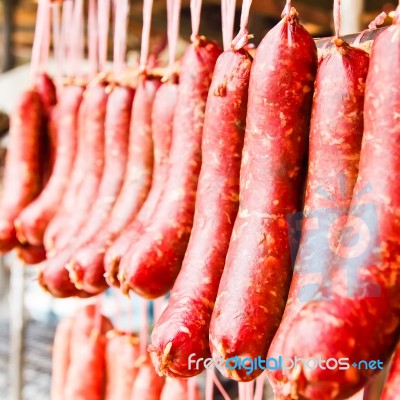 Home Made Meat Salami Sausage At Street Market Hanging In Line U… Stock Photo