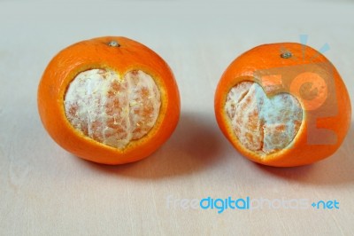 Honey Tangerines And Heart Shape Stock Photo