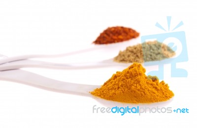 Indian Spices In Spoons Stock Photo