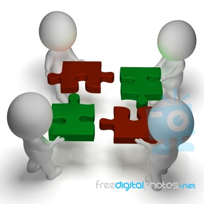 jigsaw pieces being joined shows teamwork and assembling stock image