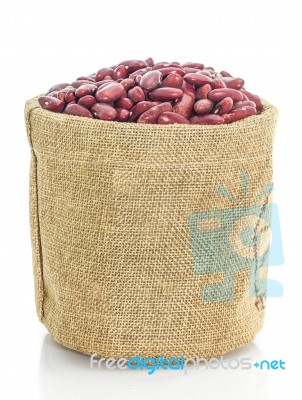 Kidney Beans In Sacks Fodder On White Background Stock Photo
