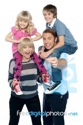 Kids Having A Good Time With Their Parents Stock Photo