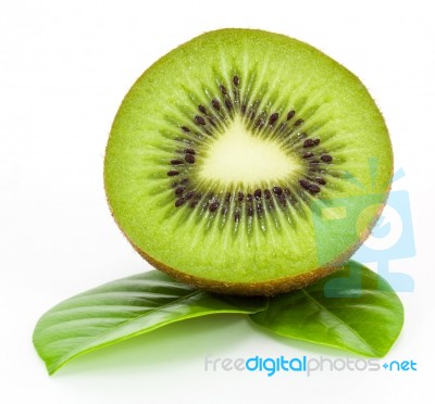 Kiwi Fruit On Leaves Stock Photo