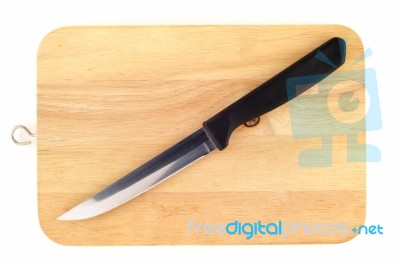 Knife On A Wooden Board Stock Photo