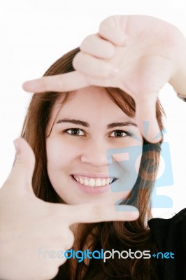 Lady Creating Frame With Her Finger Stock Photo
