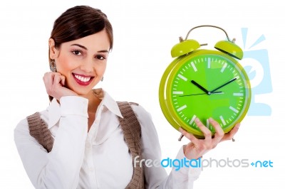 Lady Holding Alarm Clock Stock Photo