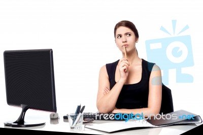 Lady Thinking Of A Solution For Client's Query Stock Photo