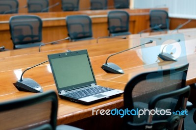 Laptop In Meeting Room Stock Photo