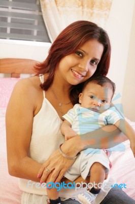 Latin Mother And Newborn Stock Photo