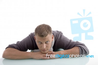 Laying Adult Male Looking At Camera Stock Photo