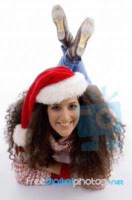 Laying Female Wearing Christmas Hat Stock Photo