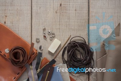 Leather And Accessories On Wooden Stock Photo