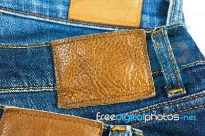 Leather Label On Blue Jeans Stock Photo
