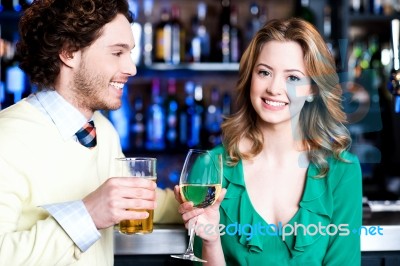 Let's Celebrate. Young Couple - Man And Woman Stock Photo