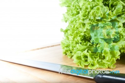 Lettuce And Knife Stock Photo