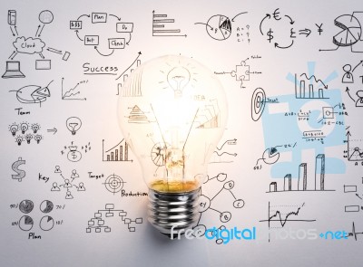 Light Bulb With Drawing Graph Inside Stock Image