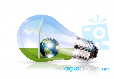 Light Bulb With Wind Turbine And Earth Inside Stock Photo