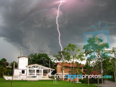 Lightning At Daylight Stock Photo