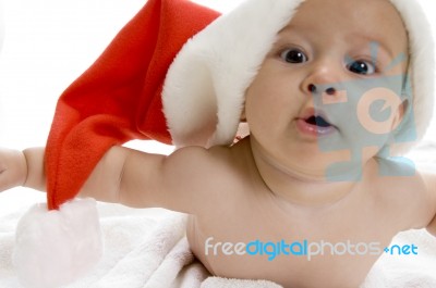 Little Baby Wearing Santa Cap Stock Photo
