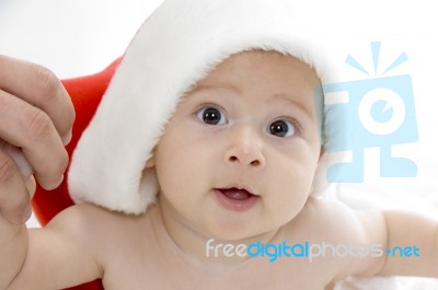 Little Baby Wearing Santa Hat Stock Photo