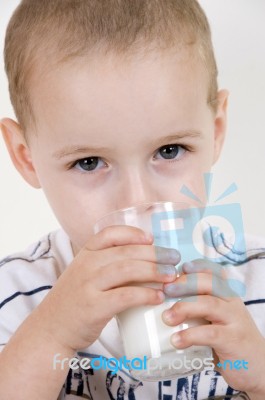 Little Boy Drinking Milk Stock Photo