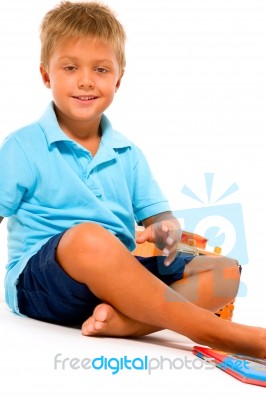 Little Boy Playing Stock Photo