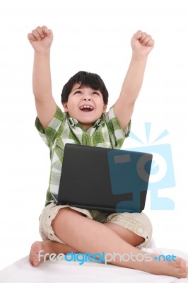 Little Boy With Laptop Stock Photo
