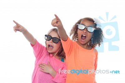 Little Girls Pointing Away Stock Photo