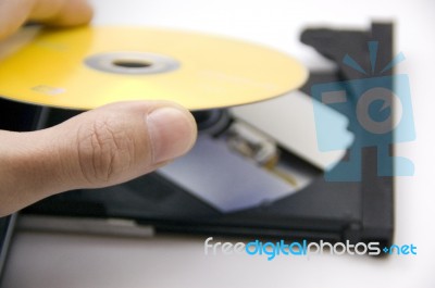 Loading A DVD Into The Player Stock Photo