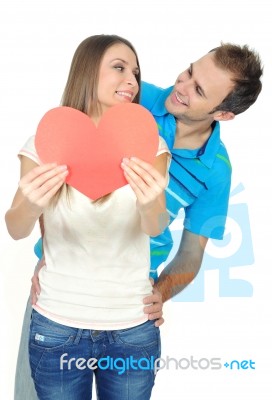 Love Couple With A Red Heart Stock Photo