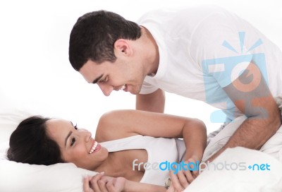 Loving Affectionate Couple In Bed Stock Photo