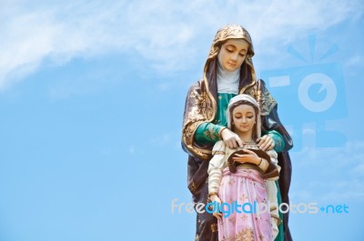 Madonna Sculpture On Top Tower Stock Photo
