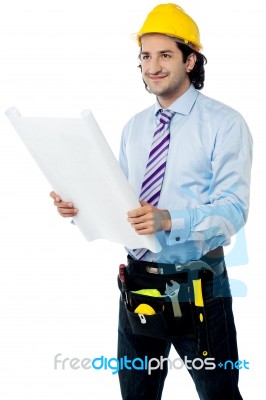 Male Architect With Construction Plan Stock Photo