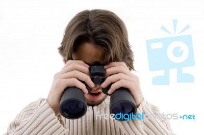 Male Looking Through Binocular Stock Photo