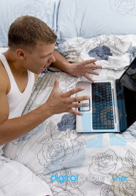 Male Working On Laptop Stock Photo