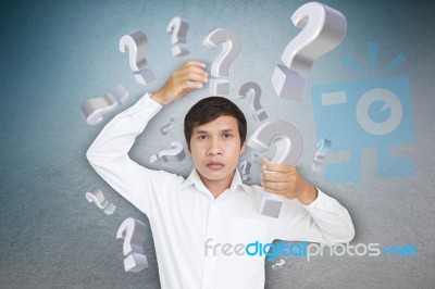 Man Carrying Question Mark Stock Photo