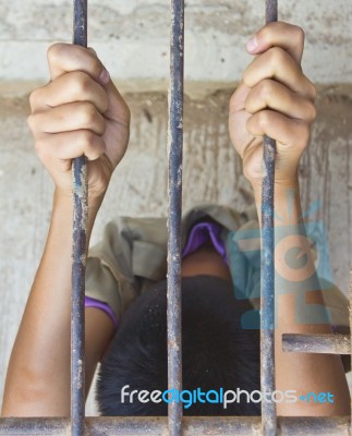 Man Grabbing Steel Cage Stock Photo Man Grabbing Steel Cage Stock Photo