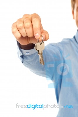 Man Hand Holding Key Stock Photo