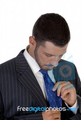 Man Looking His Tie Stock Photo