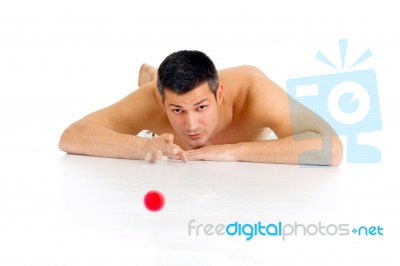 Man Lying And Playing Stock Photo