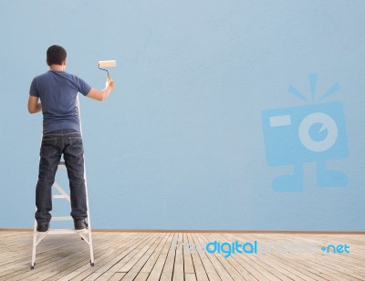 Man Painting  Wall Stock Photo