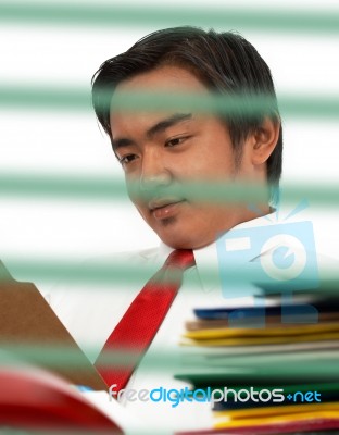 Man Reading A Document Stock Photo
